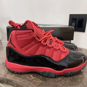 New! Unworn! Air Jordan 11 retro red and black men’s size 8